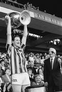 21 July 1991; Kilkenny captain Christy Heffernan lifts the Bob O'Keeffe cup in the company of Leinster Council Chairman Jimmy Gray. Leinster Senior Hurling Championship Final, Dublin v Kilkenny, Croke Park, Dublin. Picture credit; Connolly Collection / SPORTSFILE