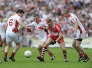 21 June 2009; Sean O'Neill, Tyrone, in action against Seamus Bradley, Derry. GAA Football Ulster Senior Championship Semi-Final, Tyrone v Derry, Casement Park, Belfast, Co. Antrim. Picture credit: Oliver McVeigh / SPORTSFILE