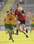 27 June 2009; Caolan Mooney, Down, in action against Peter McGonigle, Donegal. ESB Ulster Minor Football Championship Semi-Final, Donegal v Down, St. Tighearnach's Park, Clones, Co. Monaghan. Picture credit: Oliver McVeigh / SPORTSFILE *** Local Caption ***