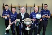 27 January 2009; Ard Stiurthoir of the GAA Paraic Duffy holding the Sigerson Cup, left, and Fitzgibbon Cup, right, with college and intercounty football and hurling stars, from left, TJ Reid, Waterford IT / Kilkenny, Richie Hogan, St. Patricks College / Kilkenny, Mark Vaughan, DIT / Dublin, and Justin McMahon, St. Mary's Belfast / Tyrone, at the launch of the 2009 Ulster Bank Higher Education Championship. Croke Park, Dublin. Picture credit: Pat Murphy / SPORTSFILE