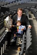 1 July 2009; The Bob O'Keeffe Cup, TV3 hurling panellist Daithi Regan and Oscar Holden, 2 and 1/2 years, at the TV3 Silverware Sunday photocall. Croke Park, Dublin. Picture credit: Ray McManus / SPORTSFILE  *** Local Caption ***