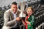 1 July 2009; Five-year-old Chloe Danton with TV3 football panellist Senan Connell and the Munster Championship Cup at the TV3 Silverware Sunday photocall. Croke Park, Dublin. Picture credit: Ray McManus / SPORTSFILE