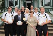 29 June 2009; Caitríona Ruane, Northern Ireland Minister of Education, with Tom Daly, Ulster Council GAA President, and Ulster GAA Coaches from Tyrone, during a visit to Woodhall Kilrea. Woodhall Residential Centre, Kilrea, Co Derry. Picture credit: Oliver McVeigh / SPORTSFILE  *** Local Caption ***