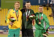 30 October 2015; Ireland's Michael McKillop, centre, from Glengormley, Co. Antrim, with his gold medal, after coming first in his Men's 1500m T37 final with a time of 4:16.19. Also pictured are second place Brad Scott, Australia, and third place Madjid Djemai, Algeria. IPC Athletics World Championships. Doha, Qatar. Picture credit: Marcus Hartmann / SPORTSFILE