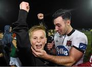 30 October 2015; Dundalk's Richie Towell celebrates with a young supporter after the game. SSE Airtricity League Premier Division, Dundalk v Bray Wanderers, Oriel Park, Dundalk, Co. Louth. Photo by Sportsfile