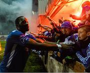 30 October 2015; Patrick Kanyuka, Limerick FC, celebrates with supporters at the end of the game. SSE Airtricity League Premier Division, Sligo Rovers v Limerick FC, The Showgrounds, Sligo. Picture credit: David Maher / SPORTSFILE