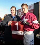 31 October 2015; Gordon Elliott, winning trainer, and Bryan Cooper, winning jockey, after winning the JN Wine.com Champion Steeplechase grade 1 race on Don Cossack. Horse Racing at Down Royal, Co. Down. Picture credit: Oliver McVeigh / SPORTSFILE