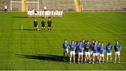 1 November 2015; Players from Scotstown and Slaughtneil stand to sing the national anthem before the start of the match. AIB Ulster GAA Senior Club Football Championship Quarter-Finals, Scotstown v Slaughtneil. St Tiernach's Park, Clones, Monaghan. Picture credit: Seb Daly / SPORTSFILE