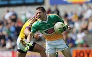 4 July 2009; Karol Slattery, Offaly, in action against Niall Murphy, Wexford. GAA All-Ireland Senior Football Championship Qualifier, Round 1, Wexford v Offaly, Wexford Park, Wexford. Picture credit: Ray McManus / SPORTSFILE