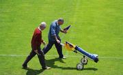4 July 2009; Groundsmen Brendan Browne and John Nolan set out the flags before the game. GAA All-Ireland Senior Football Championship Qualifier Round 1, Wexford v Offaly, Wexford Park, Wexford. Picture credit: Ray McManus / SPORTSFILE