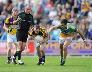 4 July 2009; Colm Morris, Wexford, in action against Alan McNamee, Offaly. GAA All-Ireland Senior Football Championship Qualifier, Round 1, Wexford v Offaly, Wexford Park, Wexford. Picture credit: Ray McManus / SPORTSFILE