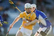4 July 2009; Neil McGarry, Antrim, in action against Tommy Fitzgerald, Laois. GAA Hurling All-Ireland Senior Championship, Phase 1, Laois v Antrim, O'Moore Park, Portlaoise, Co. Laois. Picture credit: Stephen McCarthy / SPORTSFILE