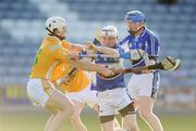 4 July 2009; Tommy Fitzgerald, Laois, in action against Neil McGarry, Antrim. GAA Hurling All-Ireland Senior Championship, Phase 1, Laois v Antrim, O'Moore Park, Portlaoise, Co. Laois. Picture credit: Stephen McCarthy / SPORTSFILE