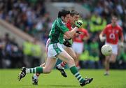 5 July 2009; Ger Collins, Limerick, in action against Ray Carey, Cork. GAA Football Munster Senior Championship Final, Limerick v Cork, Pairc Ui Chaoimh, Cork. Picture credit: Brendan Moran / SPORTSFILE