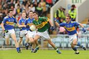 5 July 2009; Jack Sherwood, Kerry, in action against Paddy Dalton, right, and Darragh Dwyer, 7, Tipperary. ESB Munster Minor Football Championship Final, Kerry v Tipperary, Pairc Ui Chaoimh, Cork. Picture credit: Diarmuid Greene / SPORTSFILE
