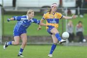 4 July 2009; Eimear Considine, Clare, in action against Grainne Enright, Waterford. TG4 Ladies Football Munster Intermediate Championship Final, Clare v Waterford, Bruff, Co. Limerick. Picture credit: Diarmuid Greene / SPORTSFILE