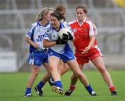 5 July 2009; Cathriona McConnell, Monaghan, in action against Gemma Begley, Tyrone. TG4 Ladies Football Ulster Senior Championship Final, Monaghan v Tyrone, Breffini Park, Cavan. Picture credit: Oliver McVeigh / SPORTSFILE
