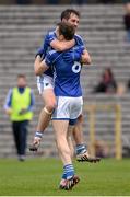 1 November 2015; James Turley and Francis Caulfield, Scotstown, celebrate their team's victory over Slaughtneil at the final whistle. AIB Ulster GAA Senior Club Football Championship Quarter-Finals, Scotstown v Slaughtneil. St Tiernach's Park, Clones, Monaghan. Picture credit: Seb Daly / SPORTSFILE