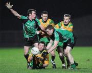 24 January 2009; Brendan Boyle, Donegal, in action against Paul Courtney and Loughrey, Queens. Gaelic Life Dr. McKenna Cup Final, Donegal v Queens. Healy Park, Omagh, Co. Tyrone. Picture credit: Oliver McVeigh / SPORTSFILE
