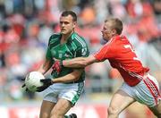 5 July 2009; Jason Stokes, Limerick, in action against Michael Shields, Cork. GAA Football Munster Senior Championship Final, Limerick v Cork, Pairc Ui Chaoimh, Cork. Picture credit: Diarmuid Greene / SPORTSFILE