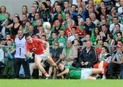 5 July 2009; Graham Canty, Cork, is tackled by Jason Stokes, Limerick. GAA Football Munster Senior Championship Final, Limerick v Cork, Pairc Ui Chaoimh, Cork. Picture credit: Diarmuid Greene / SPORTSFILE