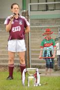 5 July 2009; A young Mayo fan looks on as Galway captain Annette Clarke makes her speech. TG4 Ladies Football Connacht Senior Championship Final, Mayo v Galway, O’Hara’s Pitch, Charlestown, Co. Mayo. Photo by Sportsfile