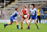 5 July 2009; Lynda Donnelly, Tyrone, in action against Ciara McAnespie and Therese McNally, Monaghan. TG4 Ladies Football Ulster Senior Championship Final, Monaghan v Tyrone, Breffini Park, Cavan. Picture credit: Oliver McVeigh / SPORTSFILE