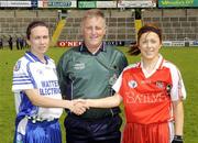 5 July 2009; Referee, Terence McShea, along with  Monaghan Captain, Sharon Courtney, and  Tyrone Captain, Sinead McLaughlin. TG4 Ladies Football Ulster Senior Championship Final, Monaghan v Tyrone, Breffini Park, Cavan. Picture credit: Oliver McVeigh / SPORTSFILE