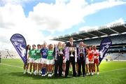 6 July 2009; Guest of honour, Sunderland chairman and former Republic of Ireland international Niall Quinn, centre, Pat Quill, President of Cumann Peil Gael Na mBan, left, and Pol O Gallchoir, TG4 Chief Executive, with senior, intermediate and junior captains at the launch of the TG4 Ladies Football All-Ireland Championships. Croke Park, Dublin. Picture credit: Stephen McCarthy / SPORTSFILE