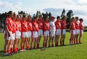 4 July 2009; The Cork team stand together during the national anthem. TG4 Ladies Football Munster Senior Championship Final, Cork v Kerry, Bruff, Co. Limerick. Picture credit: Diarmuid Greene / SPORTSFILE