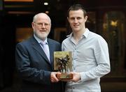 8 July 2009; Antrim footballer Michael McCann is presented with the Vodafone GAA Player of the Month Award for June by Gerry Fahy, Director of Strategy, Vodafone Ireland. Waterford's John Mullane received the Vodafone GAA Player of the Month Award for Hurling. Westbury Hotel, Dublin. Picture credit: Brian Lawless / SPORTSFILE