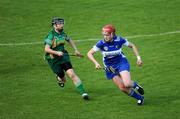 4 July 2009; Sarah Anne Fitzgerald, Laois, in action against Aofie Thompson, Meath. Gala All-Ireland Junior Camgie Championship, Meath v Laois, O'Moore Park, Portlaoise, Co. Laois. Picture credit: Stephen McCarthy / SPORTSFILE