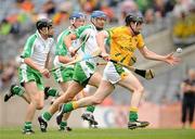11 July 2009; Neil Hackett, Meath, in action against, from left, Keith Kennedy, Niall Healy, and Fergus McMahon, London. Nicky Rackard Cup Final, Meath v London, Croke Park, Dublin. Picture credit: Brian Lawless / SPORTSFILE