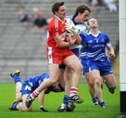 11 July 2009; James Kielt, Derry, collides with Padraid McBennett, Monaghan, after flicking in Derry's second goal. GAA Football All-Ireland Senior Championship Qualifier, Round 2, Monaghan v Derry, St Tighearnach's Park, Clones, Co. Monaghan. Picture credit: Oliver McVeigh / SPORTSFILE