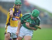11 July 2009; Donnacha Sheehan, Limerick, in action against Keith Rossiter, Wexford. GAA Hurling All-Ireland Senior Championship, Phase 2, Wexford v Limerick, Wexford Park, Wexford. Picture credit: Matt Browne / SPORTSFILE