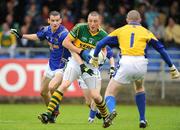 11 July 2009; Kieran Donaghy, Kerry, in action against Barry Gilleran and goalkeeper Damien Sheridan, Longford. GAA Football All-Ireland Senior Championship Qualifier, Round 2, Longford v Kerry, Pearse Park, Longford. Picture credit: Brendan Moran / SPORTSFILE