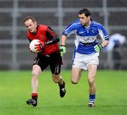 11 July 2009; Benny Coulter, Down, in action against Cathal Ryan, Laois. GAA Football All-Ireland Senior Championship Qualifier, Round 2, Down v Laois, Pairc Esler, Newry, Co. Down. Picture credit: Oliver McVeigh / SPORTSFILE