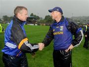 11 July 2009; Wicklow selector Kevin O'Brien, left, is congratulated by Tom Carr, the Cavan manager. GAA Football All-Ireland Senior Championship Qualifier, Round 2, Wicklow v Cavan, County Grounds, Aughrim, Co. Wicklow. Picture credit: Ray McManus / SPORTSFILE
