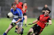 11 July 2009; Brian McDonald, Laois, in action against Kevin McKernan, Down. GAA Football All-Ireland Senior Championship Qualifier, Round 2, Down v Laois, Pairc Esler, Newry, Co. Down. Picture credit: Oliver McVeigh / SPORTSFILE