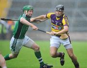 11 July 2009; Willie Doran, Wexford, in action against Seamus Hickey, Limerick. GAA Hurling All-Ireland Senior Championship, Phase 2, Wexford v Limerick, Wexford Park, Wexford. Picture credit: Matt Browne / SPORTSFILE