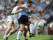 12 July 2009; Bernard Brogan, Dublin, as he shoots for goal, is tackled by Mikey Conway, Kildare. GAA Football Leinster Senior Championship Final, Dublin v Kildare, Croke Park, Dublin. Picture credit: Oliver McVeigh / SPORTSFILE