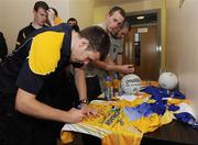 6 July 2009; Antrim's Andy McClean signs jerseys during a press night ahead of their Ulster Football Final on Sunday July 19th. Antrim football squad press evening, Creggan, Co. Antrim. Picture credit: Oliver McVeigh / SPORTSFILE