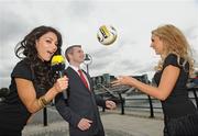 15 July 2009; Models Georgia Salpa, left, and Nadia Forde join Setanta soccer commentator Des Curran to celebrate Setanta Sports Ireland’s Barclays Premier League rights win. The Irish Sports Broadcaster was today, July 15th, awarded the rights to show exclusively live coverage of all the Saturday 3pm games for the 2009/2010 Premier League season in the Republic of Ireland. Sean O'Casey Bridge, Custom House Quay, Dublin. Picture credit: Brian Lawless / SPORTSFILE