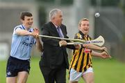 13 July 2009; Former Cork hurling goalkeeper and Sports Sponsorship Manager at Bord Gais Energy, Ger Cunningham under pressure from Bord Gais Energy Ambassadors and U21 hurlers Liam Rushe, left, of Dublin and Richie Hogan of Kilkenny, at Parnell Park ahead of the Bord Gais Energy GAA Leinster U21 Hurling Final. The match between Kilkenny and Dublin will take place in Parnell Park on this Wednesday at 7.30pm. Parnell Park, Dublin. Picture credit: Brendan Moran / SPORTSFILE