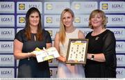 1 June 2016; Fiona Claffey, Westmeath, centre, receives her Division 2 Lidl Ladies Team of the League Award from Aoife Clarke, head of communications, Lidl Ireland, left, and Marie Hickey, President of Ladies Gaelic Football, right, at the Lidl Ladies Teams of the League Award Night. The Lidl Teams of the League were presented at Croke Park with 60 players recognised for their performances throughout the 2016 Lidl National Football League Campaign. The 4 teams were selected by opposition managers who selected the best players in their position with the players receiving the most votes being selected in their position. Croke Park, Dublin. Photo by Cody Glenn/Sportsfile