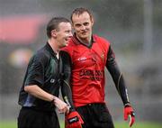 11 July 2009; Down's Benny Coulter shares a light hearted moment with referee Joe McQuillan. GAA Football All-Ireland Senior Championship Qualifier, Round 2, Down v Laois, Pairc Esler, Newry, Co. Down. Picture credit: Oliver McVeigh / SPORTSFILE