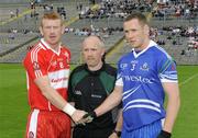 11 July 2009; Referee Marty Duffy with Derry captain, Fergal Doherty, left, and Monaghan captain Vincent Corey before the game. GAA Football All-Ireland Senior Championship Qualifier, Round 2, Monaghan v Derry, St Tighearnach's Park, Clones, Co. Monaghan. Picture credit: Oliver McVeigh / SPORTSFILE