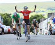 17 July 2009; Matt Bailey, BCG West Midlands, celebrates as he crosses the line to win the stage from second place Peter Williams, Stena Ireland, and third place Louis Meintjes, South Africa. M Donnelly Junior Tour of Ireland, Stage 4, Castlebar to Ballycastle, Co. Mayo. Picture credit: Kieran Clancy / SPORTSFILE