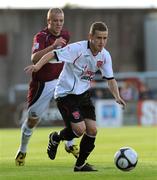 17 July 2009; Tiernan Mulvnna, Dundalk, in action against Mark O'Toole, Galway United. League of Ireland Premier Division, Galway United v Dundalk, Terryland Park, Galway. Picture credit: Ray Ryan / SPORTSFILE