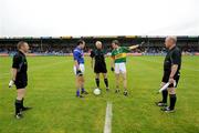 11 July 2009; Kerry captain Donncha Walsh selects which way his team will play in the first half after winning the coin toss, watched by referee Gearoid O Conamha, Longford captain Paul Barden and Linesmen Michael Duffy and Frank Flynn. GAA Football All-Ireland Senior Championship Qualifier, Round 2, Longford v Kerry, Pearse Park, Longford. Picture credit: Brendan Moran / SPORTSFILE